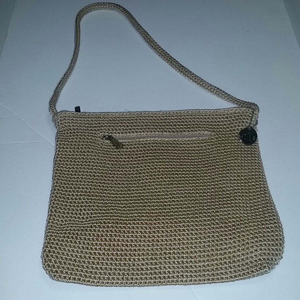 The sak sparkly gold woven shoulder bag